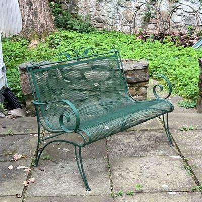 OUTDOOR IRON BENCH | Green grate patio bench with curved wrought iron scroll arms and curved legs. - l. 44.5 x w. 24.5 x h. 34.5 in

