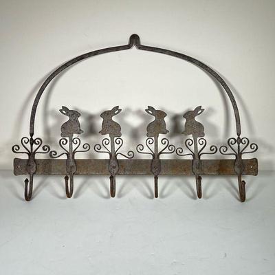 IRON WALL RACK WITH BUNNIES | Hanging wall rack with six hooks, decorated with bunny rabbits. - l. 24 x w. 2-1/2 x h. 16 in

