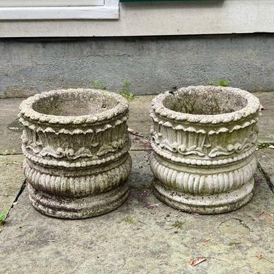 (2PC) PAIR CONCRETE PLANTERS | Pair of concrete planters with scrolling leaf motif. - h. 9 x dia. 9.5 in

