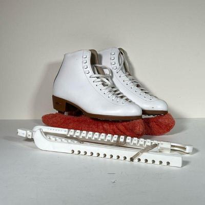 RIEDELL ICE SKATES | Women's size 7-1/2 RIEDELL skating shoes with a pair of extra guards.

