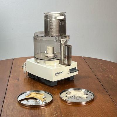 CUISINART FOOD PROCESSOR | Accessories included as pictured. - l. 7 x w. 9 x h. 14 in

