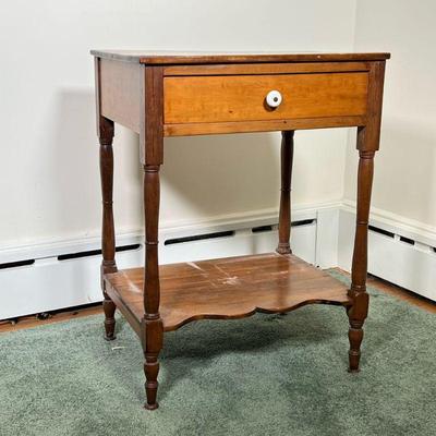 VINTAGE WOODEN SIDE TABLE | Wood side table having a single drawer with white knob and a lower shelf with scalloped front. - l. 20-3/4 x...