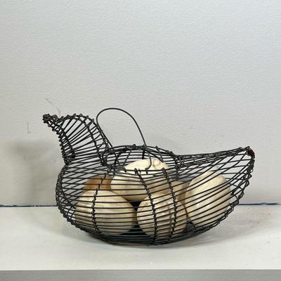 WIRE CHICKEN & WOODEN EGGS | Decorative wired chicken basket with six wooden eggs inside. - l. 9 x w. 5-1/2 x h. 5 in

