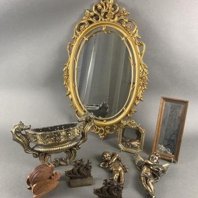 Lot 154 | Ornate Vintage Decorative Mirror, Bookends & More
