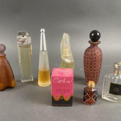 Lot 311 | Salvatore Ferragamo , Issey Miyaki, Donna Karen
