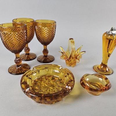 Lot 131 | Vtg Amber Goblets, Table Lighter & More!
