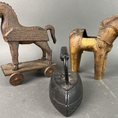 Lot 315 | Cast Iron Sad Iron & Horse Figures
