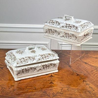 (2PC) PAIR STAFFORDSHIRE TUREENS | Pair of Staffordshire ceramic tureens with floral decoration. - l. 10.5 x w. 6.5 x h. 5 in

