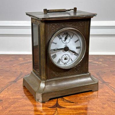 CHINESE W.M. MEYERINK & CO ANTIQUE DESK CLOCK | Carriage clock with a white face and subdials, Wurttemberg movement, metal case with...