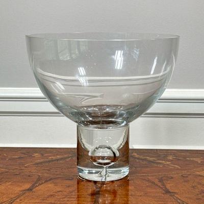 GLASS BLOWN FOOTED CENTER BOWL | Manner of kosta boda, blown base with a teardrop air bubble. - h. 8 x dia. 9 in

