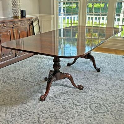 HICKORY CHAIR CO. DOUBLE PEDESTAL DINING TABLE | Double pedestal mahogany dining table with inlaid border, double pedestal vase with...
