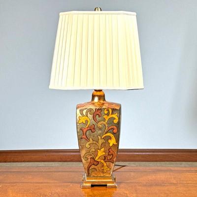 GILT SCROLLWORK DECORATED LAMP | Composition lamp with scrollwork. - l. 15 x w. 15 x h. 30 in (over shade)

