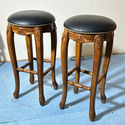 PAIR SHELL-CARVED BARSTOOLS | Each with fixed leather cushion top. - h. 31 x dia. 17 in

