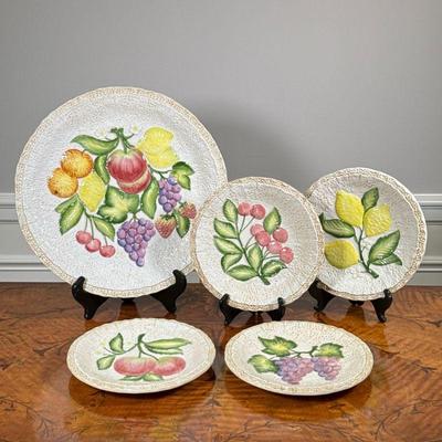 (5PC) HORCHOW FRUIT PLATES | Glazed ceramic plates showing various fruits, plus a 13-inch platter, made by Horchow in Italy. - dia. 8.5 in

