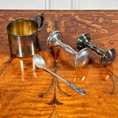 SILVER BABY ITEMS | Including: 2 silver baby rattles, Sterling silver baby spoon, and small baby cup. - h. 2.25 x dia. 2.5 in (cup)

