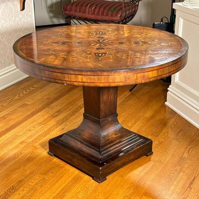 JOHN RICHARD FURNITURE ROUND PEDESTAL TABLE | Having center medallion with inlay and floral & urn design on top, tapering square...