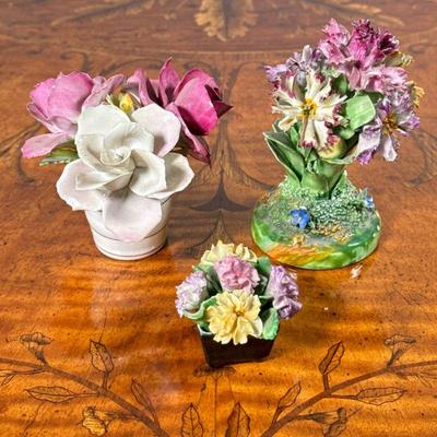 STAFFORDSHIRE & OTHER FLOWER CERAMICS | Including: bouquet of flowers and group of natural flowers by Staffordshire, and small...