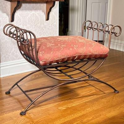 IRON SLIPPER WINDOW BENCH | Powder-coated iron slipper bench having curved arms over banded cushioned seat (reversible) with splayed...