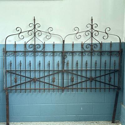 ANTIQUE WROUGHT IRON GATE | Decorative wrought iron gate welded and mounted as a headboard. - l. 75 x w. 1.25 x h. 69.5 in

