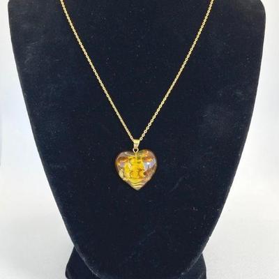 Amber w/ Carver Ship Scene Heart Shape Pendant
