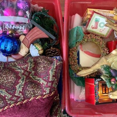Several totes of holiday decorations in this sale