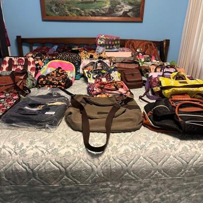 Crazy amount of purses, make up bags and more