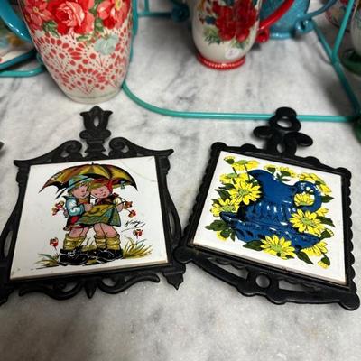 Vintage Cast iron and tile trivets