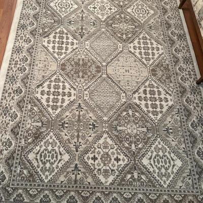 BRAND NEW RUG, WE JUST UNWRAPPED AND UNROLLED FOR YOU!Made by Manor 6.7 x 9' 