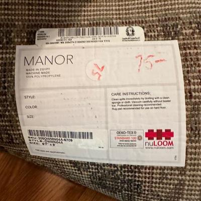 BRAND NEW RUG, WE JUST UNWRAPPED AND UNROLLED FOR YOU!Made by Manor 6.7 x 9' 