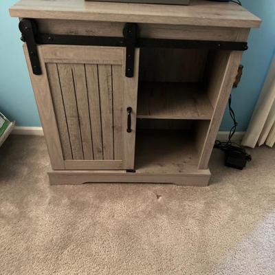 Gray Sliding Barn Door style Cabinet 