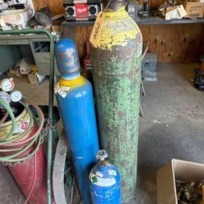 #2206 • (2) Nitrogen, (1) Oxygen, (1) Acetylene Tanks
