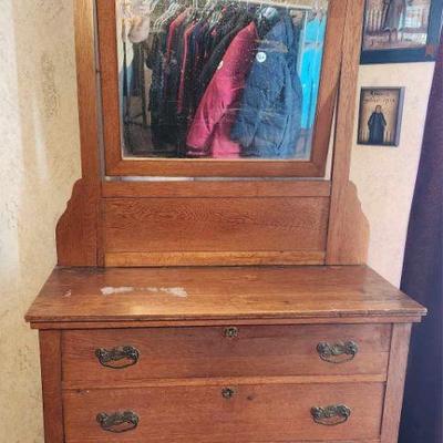 Antique mirrored dresser.