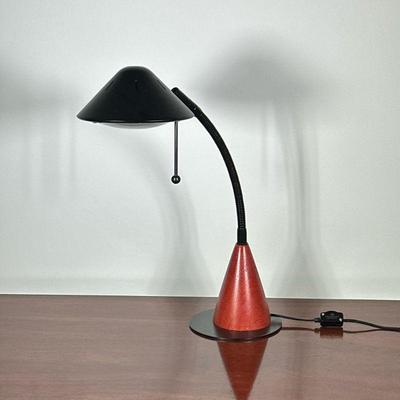 ARTICULATING DESK LAMP | Having turned wood vase on circular metal base with articulating neck. - l. 13 x w. 6 x h. 17.5 in


