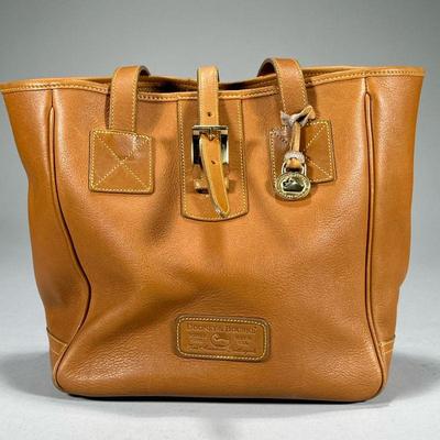 DOONEY & BOURKE LEATHER PURSE | Dooney & Bourke caramel leather purse Made in USA from Norwalk CT. - l. 13 x w. 6 x h. 10 in

