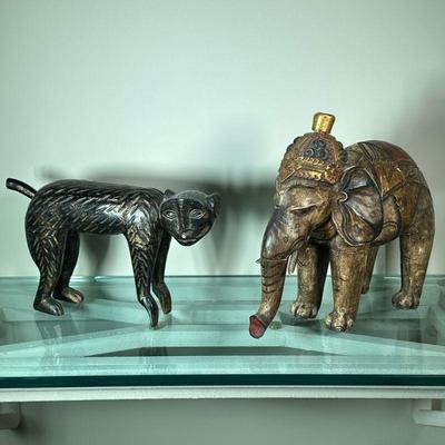 CARVED ANIMALS | Including: wood carved monkey and composite painted elephant. - l. 12.5 x w. 6 x h. 12.5 in

