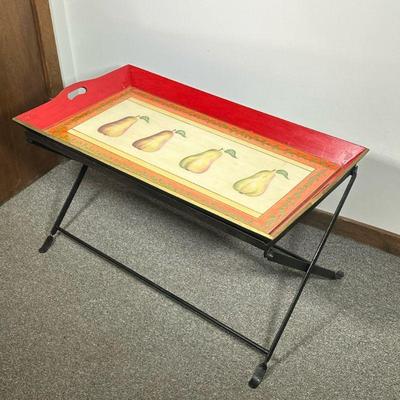 TRAY TABLE | Large tray table with folding metal base, having painted tray with glass top. - l. 36.5 x w. 21.5 x h. 20 in

