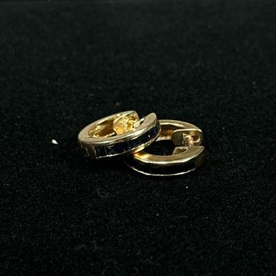 SAPPHIRE & 14K GOLD EARRINGS | Circular 14K gold earrings with baguette-cut sapphires, marked “14K” Total weight; 4.4g.

