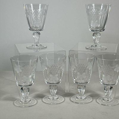 MARIO CIONI CUT CRYSTAL GLASSES | Set of 6 cut crystal water glasses with etched grapes, signed on bottom. - h. 5.75 x dia. 3.25 in

