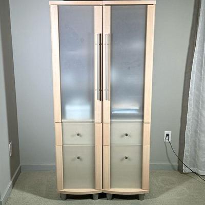 WOOD & GLASS ARMOIRE | Comprised of 2 pieces, wood and sandblasted glass armoire with 2 3-shelved cabinets over 2 drawers. - l. 31 x...
