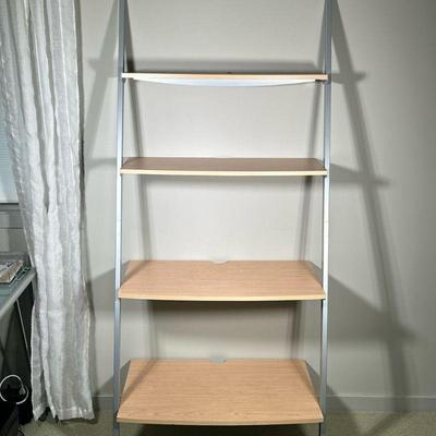 LEANING SHELVING UNIT | Having 4 graduating shelves in leaning position. - l. 33.25 x w. 22 x h. 74.5 in

