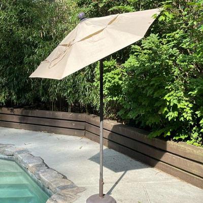 SMALL OUTDOOR PATIO UMBRELLA | Having metal stand, manual opening with pin to hold it up. - h. 92 x dia. 68 in

