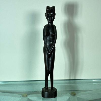 KENYAN WOOD CARVING | Carved wood figurine of a woman, marked on bottom “Made in Kenya". - l. 2 x w. 2 x h. 12.25 in


