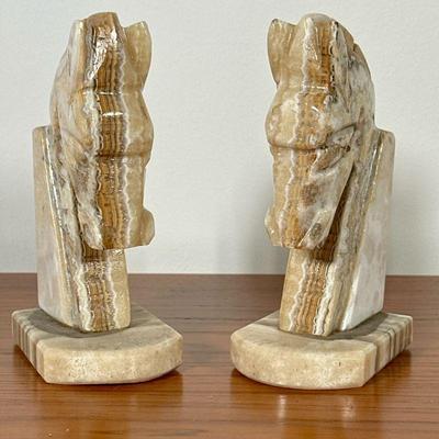 CARVED STONE HORSE BOOKENDS | Carved stone horse-form bookends. - l. 3.75 x w. 2.5 x h. 6.5 in

