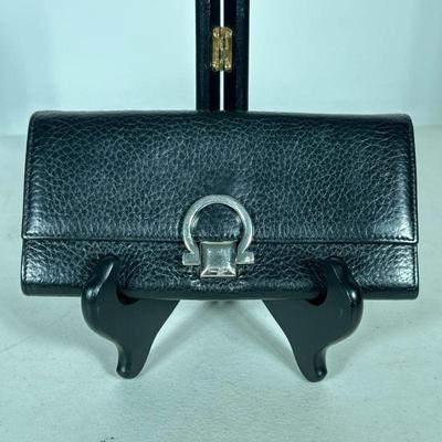 FERRAGAMO EVENING CLUTCH | Black leather Ferragamo evening bag. - l. 7.5 x w. 4 x h. 3.5 in

