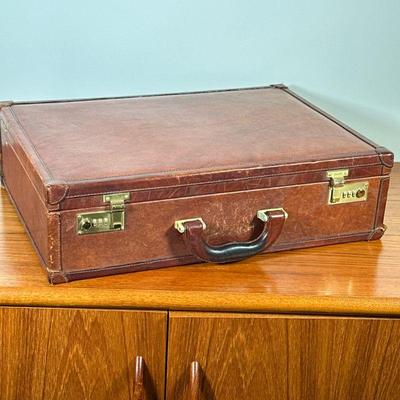 BALLY LEATHER SUITCASE | Having 3 document folders, card holders, pen holder and brass hardware. - l. 18.75 x w. 13.5 x h. 5.25 in

