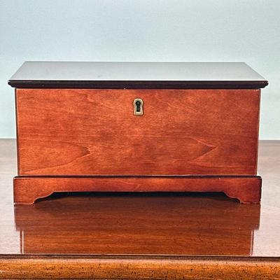 WOOD JEWELRY BOX | Having black felt interior with ring holders and various compartments and removable top shelf. - l. 11.25 x w. 6 x h....