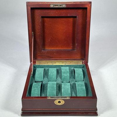 BOMBAY MAHOGANY WATCH CASE | Carved wood watch storage box having green felt interior with room for 8 watched. - l. 7.75 x w. 7.75 x h. 4...
