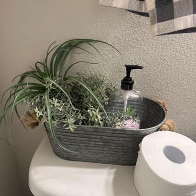 Metal storage, decorative plant