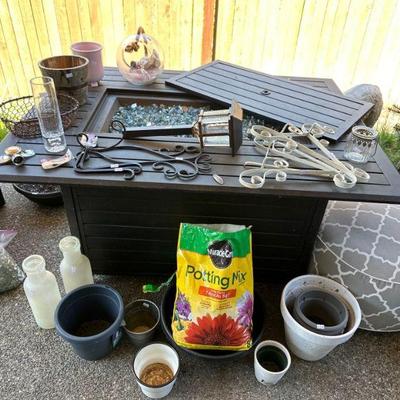 Propane fireplace & assorted pots 