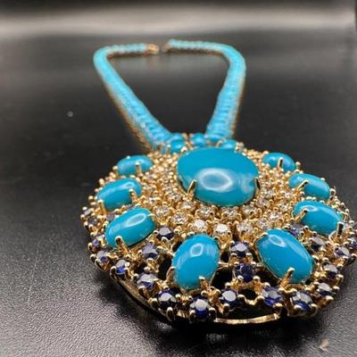 Turquoise, sapphire and diamond on 14k gold setting